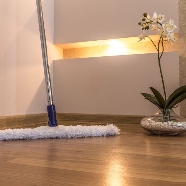 43025252 - modern white mop cleaning wooden floor in house